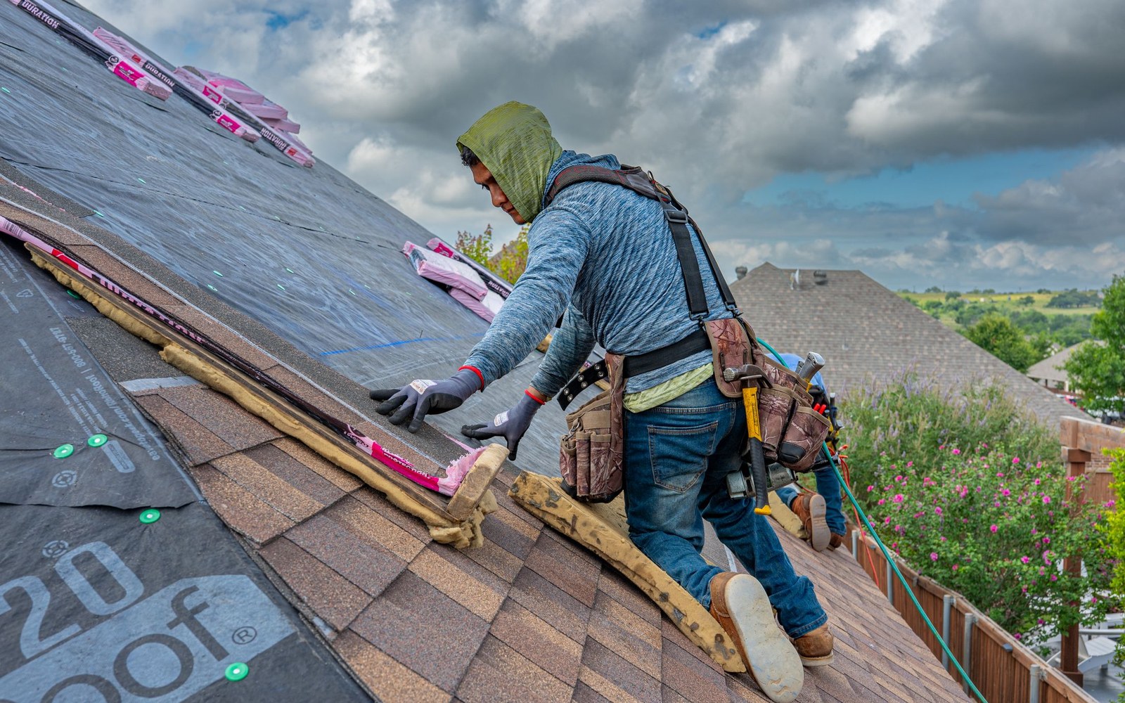Contractor installing a residential roof